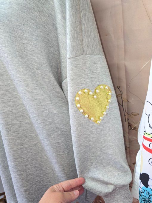 Pull à perle coeur